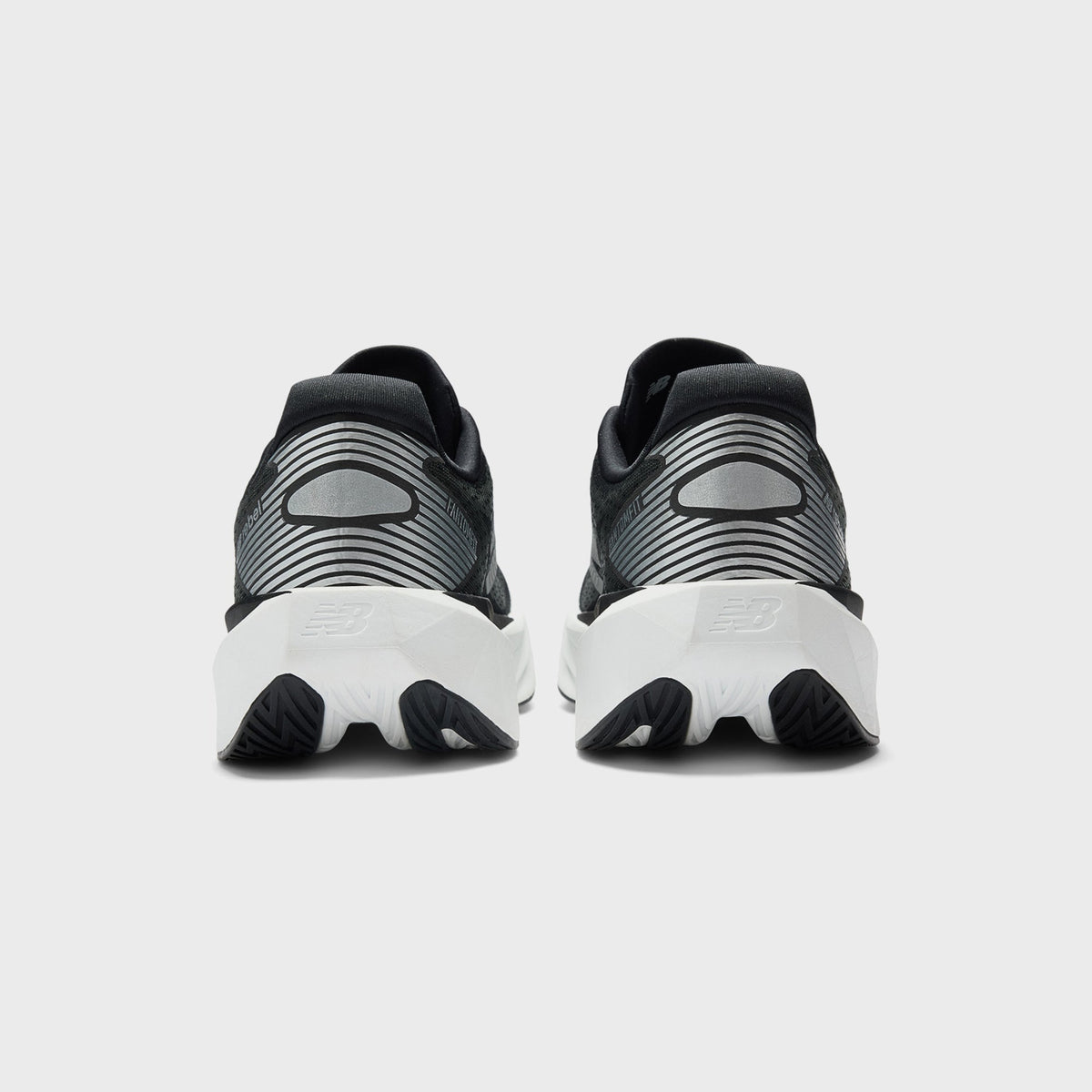 New Balance FuelCell Rebel v5 - Black / White